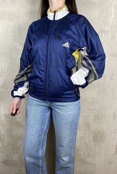 Adidas Equipment Vintage 90's Windbreaker Women's Track Jacket  Size: XS Excellent condition, no spots and holes Measurements: - armpit to armpit                        48 cm (18,89 inch) - length                                       79 cm (31,10 inch) - sleeve length from throat         79 cm (31,10 inch) - armpit to cuff                            56 cm (22,04 inch) Worldwide shipping Adidas Equipment, 90s Windbreaker, Jacket Adidas, Adidas Vintage, Womens Windbreaker, Vintage Adidas, Track Jacket, Track Jackets, 10 Inch