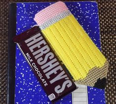 hersheys chocolate bar on top of a blue and white tile with the word hershey's in it