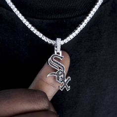 GLD has teamed up with the MLB to introduce the official MLB Team Pendants. This piece was meticulously crafted with black hand-set stones to accurately depict the logo of the Chicago White Sox. Rep your squad with the official logo pendant of the Chicago White Sox! This product is guaranteed for life - GLD will repair the item should you experience any defects in craftsmanship or breakage. Specifications - 3/4" x 1 3/4" (Width x Height) - Weight: (Weight can vary +/- 5 grams) - 14k White Gold P Nike Fashion Shoes, Nike Bags, Mens Fashion Jewelry, Vermeil Jewelry, Custom Earrings, Black Hand, White Sock, Drop Necklace, Chicago White Sox