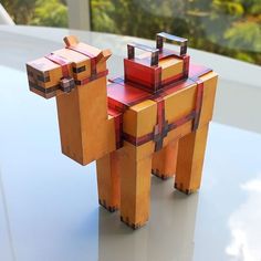 an origami horse is sitting on a table