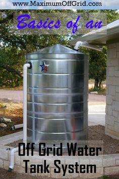 a large metal tank sitting in the middle of a yard next to a brick wall