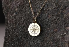 "Compass necklace, compass pendant, compass jewelry, 14K solid gold necklace, compass charm, compass gift, personalized compass pendant, necklace for woman, necklace for man, custom pendant, traveler gift * Material: Pendant and chain are 14k Yellow Solid Gold * Pendant thickness: 0.70 mm * Inner diameter of jump ring: 4 mm * Pendant diameter: 0.55 inch (14 mm) 0.60 inch (15.30 mm) 0.65 inch (16.50 mm) 0.70 inch (17.78 mm) 0.75 inch (19.10 mm) * Chain length: 14 inch (35 cm) 16 inch (40 cm) 18 i Gold Compass Necklace, Compass Pendant Necklace, Hourglass Pendant, Compass Jewelry, Gold Necklace For Women, Woman Necklace, Custom Pendant, Pretty Jewelry Necklaces, Compass Pendant