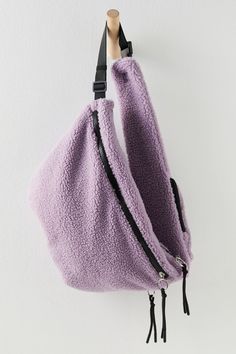 Grab all your essentials and go with this super cozy sherpa sling bag from FP Movement. Fit & Design: Sling style Faux sherpa fabrication Adjustable sherpa-padded shoulder strap Mini strap pocket Hidden side zipper pocket Zipper closure Lavender Purse, Free People Bags, Free People Activewear, Sweatsuit Set, Free People Movement, Fp Movement, Purple Bags, Purple Fashion, Free Bag