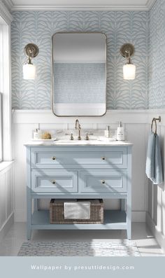 a bathroom vanity with two sinks and a large mirror