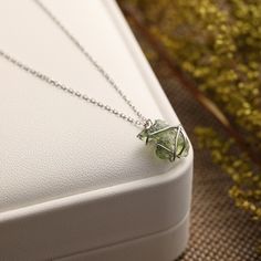 HOW TO ORDER? 1-Please click on the finish option and select the Moldavite size that suits you and the material you want. 2-Please click on the necklace length option and select the necklace length that you want. 3-Add to cart and continue. We will created with love! Small: 8-10mm Medium: 12-15mm Large: 16-20mm MOLDAVITE: Moldavite was formed 15 million years ago as a result of a meteorite collision with the Earth. It is renowned for its high energy, ability for positive change, and activating t Adjustable Silver Necklace With Mineral Crystal, Wire Wrapped Pendant Necklaces For May Birthstone, Nickel Free May Birthstone Pendant Necklace, Wire Wrapped Necklaces As May Birthstone Gift, Round Mineral Crystal Necklaces For Gifts, Green Necklace With Natural Stones And Metal, Green Necklace With Natural Stones In Metal, Green Metal Necklace With Natural Stones, Healing Nickel-free Necklaces With Mineral Crystal