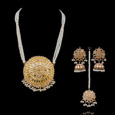 Explore the timelessness of magnificent ornaments rooted in tradition! Experience a contemporary nod on classic thappa kundan set crafted with pearl moti to attain a resplendent look. The set includes a mala, a maang teekah and a pair of beautiful earrings. Gold-plated on high-quality brass as base metal. In-stock & ready-to-ship. *Please Note: We use faux stones and beads in all of our jewelry. Heritage Jewellery, Waist Chain, Faux Stone, Head Accessories, Base Metal, Men's Collection, Earrings Gold, Ring Gift, Beautiful Earrings