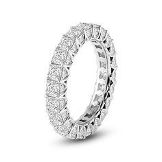 a diamond set wedding ring in 18k white gold with princess cut diamonds on each side