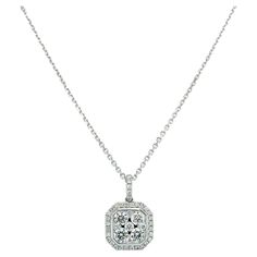 Add a touch of elegance to your outfit with this stunning 0.80ct diamond cushion illusion set pedant necklace. Crafted from 18k white gold, this necklace boasts a solitaire setting style with a round shape and pear-shaped main stone. The necklace is perfect for engagement and features a pearl pendant necklace that complements the overall design. The necklace is made from high-quality crystal material and is perfect for those who appreciate art-themed jewellery. Get this beautiful necklace today Pear Shaped Diamond Necklace, White Gold Cross Pendant, Necklace For Everyday, Diamond Drop Pendant, Solitaire Setting, Drop Pendant Necklace, Gold Cross Pendant, Dangle Necklaces, Cushion Diamond