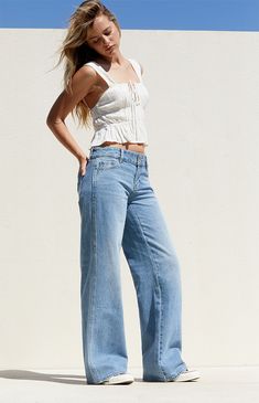 Step up your style this season with the Medium Indigo Double Button Low Rise Baggy Jeans from PacSun. Featuring a trendy low-rise waist and an ultra-slouchy full-length leg, these jeans offer a relaxed, baggy fit that exudes laid-back vibes. Complete with a classic 5-pocket body and a double button front zip fly closure, they're the perfect combination of comfort and style for any casual occasion. They're crafted from sustainably sourced rigid cotton for a durable and eco-conscious update.

Learn more about PacSun eco items Pacsun Outfits, Thrift Board, Slim Fit Cargo Pants, Low Rise Baggy Jeans, Jeans Pacsun, Preppy Shoes, Pacsun Jeans, 2024 Christmas, Jeans Kids