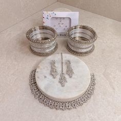 The Perfect Gift! This beautifully presented jewellery set includes our Silver Freda necklace set with a small set of matching bangles and elegant diamante Bindi pack. Ready to ship as seen with gift packaging as standard Ready to Ship Worldwide Bridal Survival Kit, Bangle Box, Dessert Gifts, Ear Chain, Bridal Choker, Kundan Set, Bridal Necklace Set, Head Jewelry, Kundan Earrings