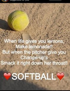 a softball sitting on top of a sandy field with the words softball written below it