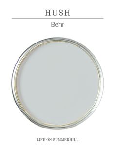 a white plate with the words hush behr on it and an image of a silver rim