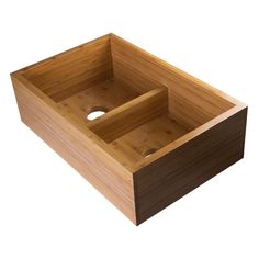 a wooden sink with two holes in the bottom and one hole at the top, on a white background