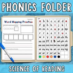 a book with the words phonics folder on it and a pen next to it