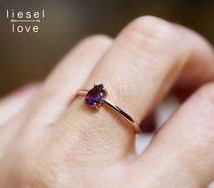 "Celebrate your favorite February baby with our \"London Calling\" ring in 14K gold and amethyst! The deep purple stone is perfect on its own or stacked with our other rings! - Amethyst measures 6mm x 4mm - Available in 14K rose, yellow or white gold - Round band measures 1.3mm For our blue topaz \"London Calling\" ring please click here: https://www.etsy.com/listing/568678755/14k-gold-london-blue-topaz-ring-london?ga_search_query=london+calling&ref=shop_items_search_1 Processing times - Cur Purple Birthstone Promise Ring In 14k Gold, Purple 14k Gold Promise Birthstone Ring, 14k Gold Amethyst Ring With Prong Setting For Promise, 14k Gold Amethyst Ring With Accent Stones For Promise, 14k Gold Amethyst Promise Ring With Gemstone Accents, Purple Birthstone Ring In 14k Gold As Gift, Gold Amethyst Ring, Ring Purple, Purple Rings