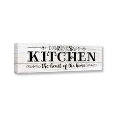 the kitchen is the heart of the home sign