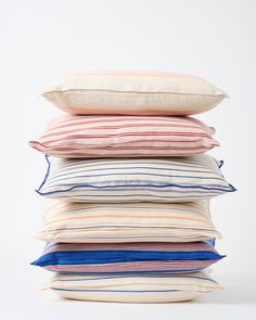 four pillows stacked on top of each other