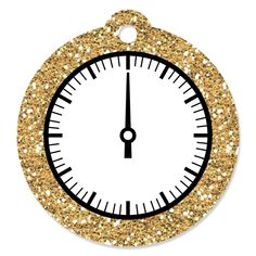 a clock with gold glitter on it is shown in the shape of an ornament