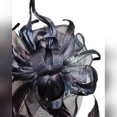 New Black Organza Tulle And Feather Fascinator Clip On Headband Hat Size: One Size Elevate Your Style And Make A Statement With Our Exquisite New Black Organza Tulle And Feather Fascinator Clip-On Headband Hat. This Elegant Accessory Combines Classic Charm With Modern Flair, Making It The Perfect Choice For Special Occasions And Fashion-Forward Events. Crafted With Meticulous Attention To Detail, The Organza Tulle And Delicate Feather Accents Add A Touch Of Sophistication And Intrigue To Your En Black Costume Hats For Royal Ascot Party, Chic Black Fascinator For Races, Black Structured Crown Costume Hat For Party, Elegant Black Fascinator For Evening, Elegant Black Costume Hats And Headpieces For Events, Black Costume Hat With Structured Crown For Party, Black Party Fascinator With Structured Crown, Black Top Hat With Structured Crown For Party, Adjustable Black Feather Headpiece