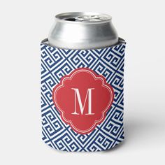 a can cooler with a monogrammed pattern and a red initial on the front