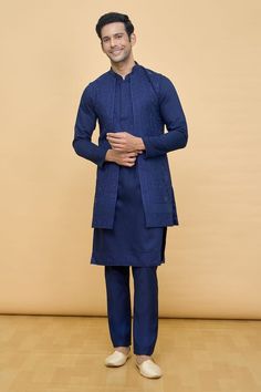 Navy blue longline Nehru jacket with tonal thread work and beaded embroidery. Comes with embroidered placket and bordered kurta and a pant. - Aza Fashions Eid Outerwear Straight Kurta With Intricate Embroidery, Fitted Blue Outerwear With Chikankari Embroidery, Eid Chikankari Embroidery Straight Kurta Outerwear, Fitted Long Sleeve Kurta With Tonal Embroidery, Eid Chikankari Embroidery Straight Kurta, Eid Outerwear Straight Kurta With Resham Embroidery, Traditional Blue Outerwear With Intricate Embroidery, Fitted Blue Nehru Jacket With Chikankari Embroidery, Traditional Blue Nehru Jacket With Chikankari Embroidery