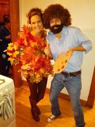 a man and woman dressed up in costumes