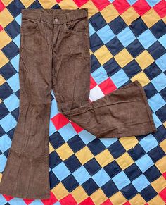 Vintage 1970's 1979s Levi's Chocolate Brown  Corduroy Bell Bottoms  Kids size ~ not exactly sure what size so please rely on measurements ~ my guess is that it's a size 7/8 kids  In excellent vintage condition  No stains  No holes  Measurements taken with pants laid flat  37" long  12.5" waist 16" hips  9" thigh  11" wide cuff  💚Please review measurements before purchasing~ vintage tag sizes differ from modern sizes  Happy to answer any questions No refunds  Thank you! I will be reusing materia Corduroy Bell Bottoms, 70s Levis, Hockey Sweatshirts, Olive Oyl, Etiquette Vintage, Brown Corduroy, Striped Polo Shirt, Wide Cuff, Kids Pants