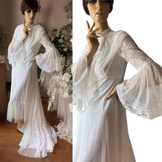 Beautiful vintage 70s wedding dress. Amazing sleeves Zip back, train which hangs beautifully! So pretty! Probably handmade, polyester feel fabric. See measurements below, Measures approx across underarms 16 inches, across waist 13 inches, length 55 inches at front and with train 77 inches. I will add pictures of any labels if the item has them.  Please go by measurements for sizing as vintage comes up different and the size in the title is a rough guide based on UK sizing.  All items are vintage 1970s White Maxi Dress, 70s Wedding Dress, Maxi Dress Wedding, Maxi Dress Evening, Vintage 70s, Vintage Wedding, Bridal Dresses, Bridal Gowns, Dress Outfits