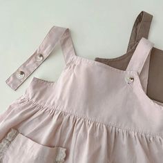 Charm in simplicity 🌸! Perfect for sunny days, this adorable Girls Solid Suspenders Dress keeps your little one comfy and stylish. A delicate lace trim adds a touch of elegance to the breathable cotton, mid-calf A-line cut. Ideal for ages 1-6, it's a summer staple! #CuteKidsFashion #SummerDress Specifications: Age Range: 1-6 years Season: Summer Gender: Girlsdr Material: Cotton Dress Length: Mid-Calf Style: Cute Department Name: Children Collar: Square Collar Sleeve Style: Regular Pattern Type: Solid Silhouette: A-Line Sleeve Length: Sleeveless Fit: Fits true to size, take your normal size Decoration: Lace Spring Cotton Sundress Suspender Dress, Summer Cotton Suspender Dress With Tie Straps, Cotton Suspender Dress With Spaghetti Tie Straps, Casual Cotton Suspender Dress With Ruffles, Summer Cotton Suspender Dress With Adjustable Straps, Cotton Suspender Dress With Adjustable Straps For Summer, Spring Cotton Suspender Dress With Tie Straps, Summer Sleeveless Suspender Dress With Lace Trim, Cute Cotton Suspender Dress For Summer