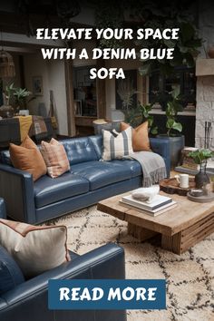 Denim blue sofa in a stylishly decorated living room with a rustic coffee table.