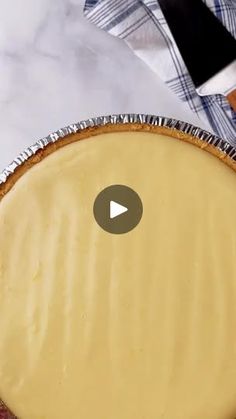 a pie sitting on top of a table covered in tin foil