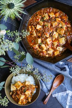 tofu and rice in a skillet on a table