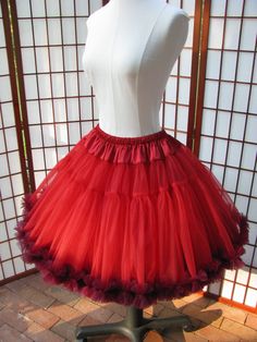 "This listing is for a custom order for a super-full double layer nylon organdy petticoat with satin waist and chiffon bottom ruffles. The pictured petticoat was designed for a 26.5\" (67,3 cm) waist and is 20\" (50,8 cm) long. It is displayed on a dress form with a 22\" (55cm) waist. You can choose any length you need. I will lengthen each of the tiers to achieve extra length. If you would prefer that I add another tier to achieve extra length, then the price will increase substantially. If you Party Petticoat With Ruffles In Crinoline, Tulle Petticoat With Ruffled Skirt For Costume Party, Tulle Ruffled Petticoat For Costume Party, Ruffled Tulle Petticoat For Costume Party, Party Organza Petticoat With Ruffles, Fitted Tulle Petticoat With Ruffles, Elegant Tulle Petticoat With Ruffles, Organza Petticoat With Ruffles For Parties, Red Full Skirt Petticoat For Party