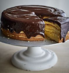 a cake with chocolate frosting on a plate