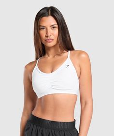 Gymshark Ruched Sports Bra - Black | Gymshark Gym Shark Tops, Gym Shark Sport Bras, Gym Shark Bra, White Sports Bra With Adjustable Straps For Light Exercise, White Activewear With Adjustable Straps For Light Exercise, Gymshark Ruched, Gym Shark Outfit, Beyonce Costume, Gymshark Set