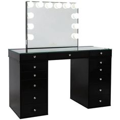 a black vanity with lighted mirror and drawers