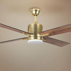 a ceiling fan with two wooden blades and a light fixture on it's side