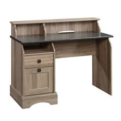 a wooden desk with drawers and a glass top