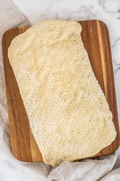 flat bread on a wooden cutting board