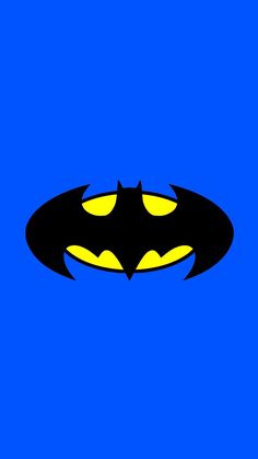 the batman symbol is shown in yellow and black on a blue background with two eyes