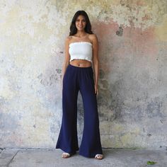 These Palazzo Pants for Women offer the perfect combination of sophisticated elegance and rebellious style, making them a versatile addition to any summer wardrobe. They are handmade with high-quality double gauze cotton fabric that has a crinkled/ waffle texture, giving them a unique look. The elastic waist and two side pockets ensure superior comfort and convenience. These pants are available in various size options, including plus sizes and tall lengths. The dark blue / navy color is perfect Cotton Gauze Pants, Cotton Palazzo Pants, Smocked Tube Top, Gauze Pants, Cotton Gauze Fabric, Womens Wide Leg Pants, Double Gaze, Pants Cotton, Red Dark