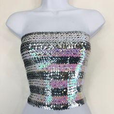 Silver and Opal Pink Striped Sequin Strapless Tube Top is made with high quality sequins on the outside, as well as polyester on the inside. The size of the tube top is 12 inches wide and 10 inches tall when flat. It is also stretchy and form fitting as well. If you have any questions about our products or have any inquiries please contact us and I will be glad to help. *Since this item is hand-made, the design can vary slightly from the image. Chanel Style Jacket, Top Bustier, Tube Tops, Glitter Diy, Body Glitter, Long Black Hair, Green Sequins, Pink Sequin, Bustier Top