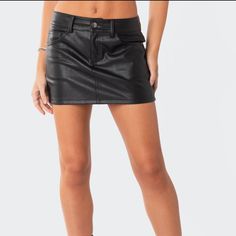 Faux Leather Mini Skirt Trendy Faux Leather Mini Skort, Trendy Faux Leather Skort For Fall, Edgy Faux Leather Skirt For Club, Black Leather Mini Bottoms, Edgy High-waist Faux Leather Skirt, Edgy High Waist Faux Leather Skirt, Edgy Faux Leather Skirt For Spring, Trendy Leather Mini Skirt, Trendy Faux Leather Skirt For Going Out