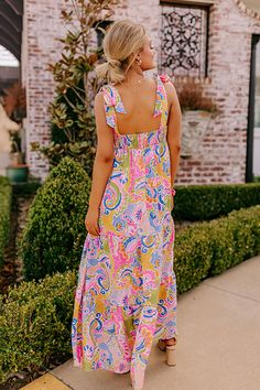 - Get a resort ready look with this vibrant maxi! - Colorful material with a paisley print - A built-in partial lining ending above the knee - A square cut neckline - 1.5 inch tie closure straps - A smocked upper back - Hidden side pockets - A flowy silhouette that ends in a rifle maxi length hemline Paisley Maxi Dress, Square Cut, Above The Knee, Paisley Print, The Knee, Paisley, Built In, Maxi Dress, Luxury Fashion