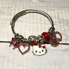 Cute Red And White Hello Kitty Charm Bracelet. Nwot. Hello Kitty Adjustable Jewelry For Gifts, Adjustable Hello Kitty Jewelry Gift, Adjustable Hello Kitty Jewelry, Adjustable Hello Kitty Jewelry As Gift, Red Heart-shaped Metal Bracelets, Red Heart-shaped Metal Bracelet, Cute Red Bracelet Jewelry, Cute Red Bracelets As Gift, Cute Red Bracelets For Gift