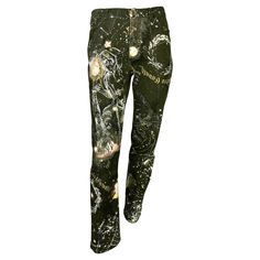 Presenting a pair of stunning astrology print jeans designed by Roberto Cavalli. Since 2003, this sought-after print has featured constellations, horoscope signs, and glittery metallic logos. Check out our storefront for more Y2K Roberto Cavalli in this iconic print! Approximate measurements: S Approximate measurements: Size - Large Waist: 29" - 31" Hips:38 - 42 Inseam: 30 Total length: 39.5 97% cotton, 2% elastane, 1% polyamide Constellation Jeans, Astrology Logo, Collage Pics, Fashion School, Print Jeans, Doll Fashion, Horoscope Signs, Fashion 2024, Printed Jeans