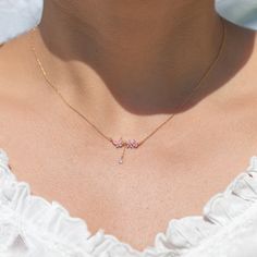 Our Dixie Necklace is the perfect way to add a pop of pink and whimsy to your look! Featuring a beautiful butterfly charm, it's sure to flutter its way into your heart! You'll never want to take it off! Dainty Pink Charm Necklace With Delicate Chain, Dainty Pink Charm Necklace With Adjustable Chain, Pink Delicate Charm Necklace With Delicate Chain, Delicate Pink Charm Necklace With Delicate Chain, Feminine Pink Necklace With Adjustable Chain, Pink Pendant Charm Necklace With Delicate Chain, Pink Butterfly Charm Necklace For Gift, Dainty Pink Butterfly Necklace As A Gift, Dainty Pink Butterfly Necklace For Gift