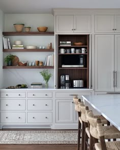 the kitchen is clean and ready to be used as a dining room or office space