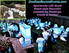 an outdoor event with blue and white decorations