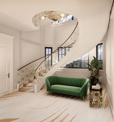 a green couch sitting in front of a spiral stair case next to a white staircase